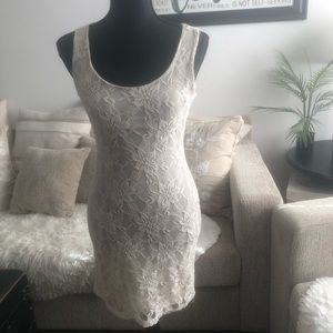 Woman’s Sleeveless Cream Bodycon dress with Lace Overlay - Small